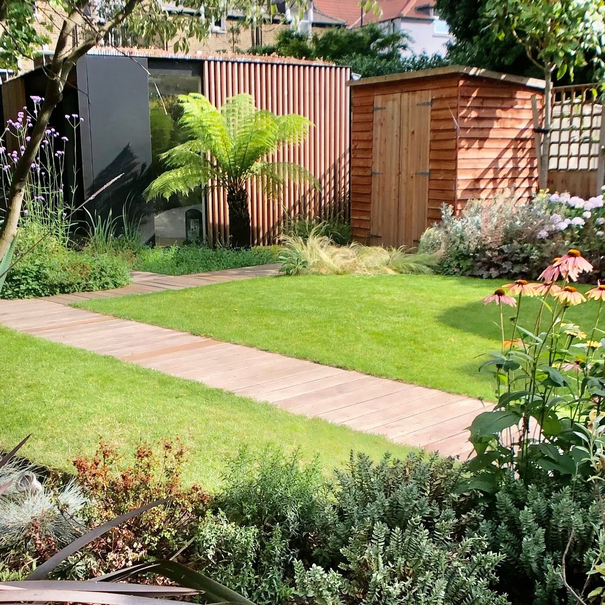 Garden Landscape and Build in Clapton Hackney East London with Integrated Pond Installation and Garden Room