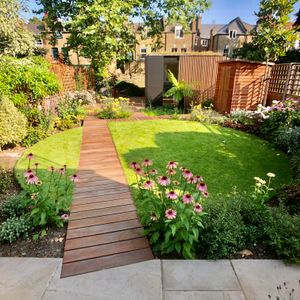 Garden Landscape and Build in Clapton Hackney East London with Integrated Pond Installation and Garden Room
