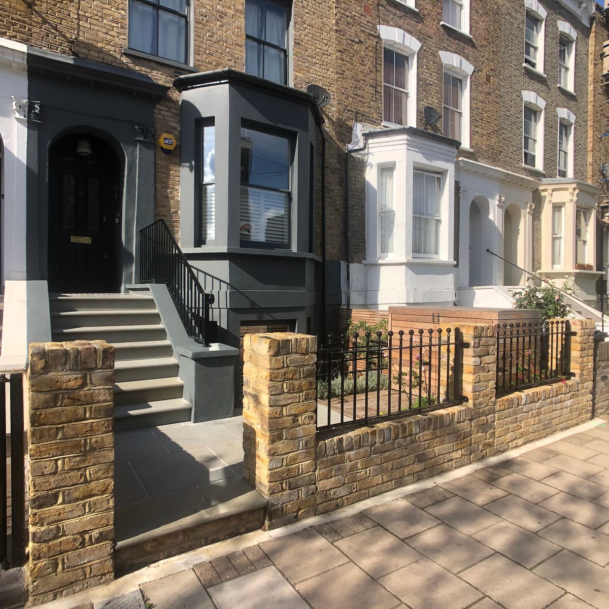 Garden Landscape Design in Stoke Newington Hackney North London with Yorkstone Steps and New Retaining Wall