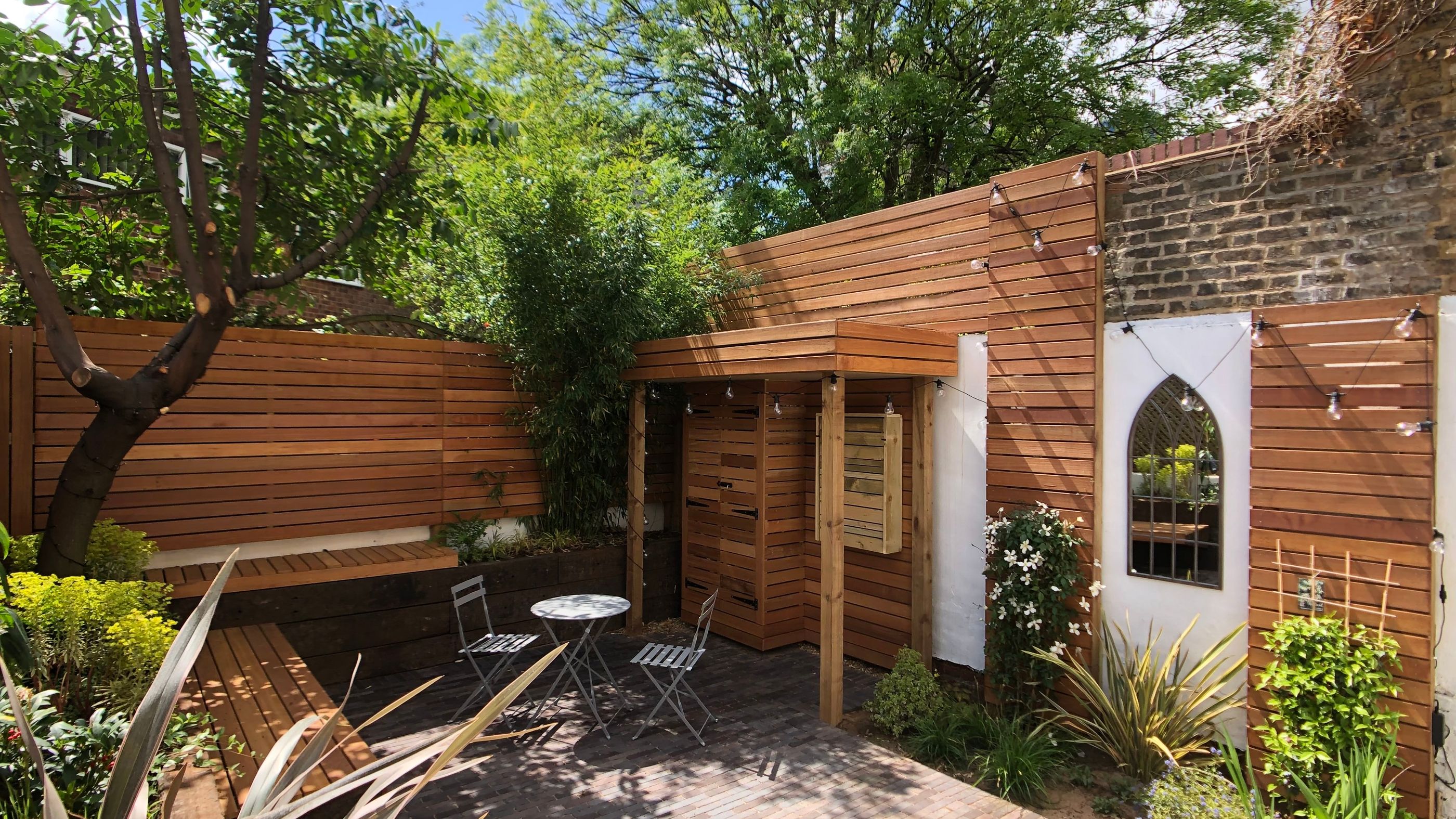 Garden Landscaping in Hackney Central North London with Hardscape Features such as Fencing and Brick Patio