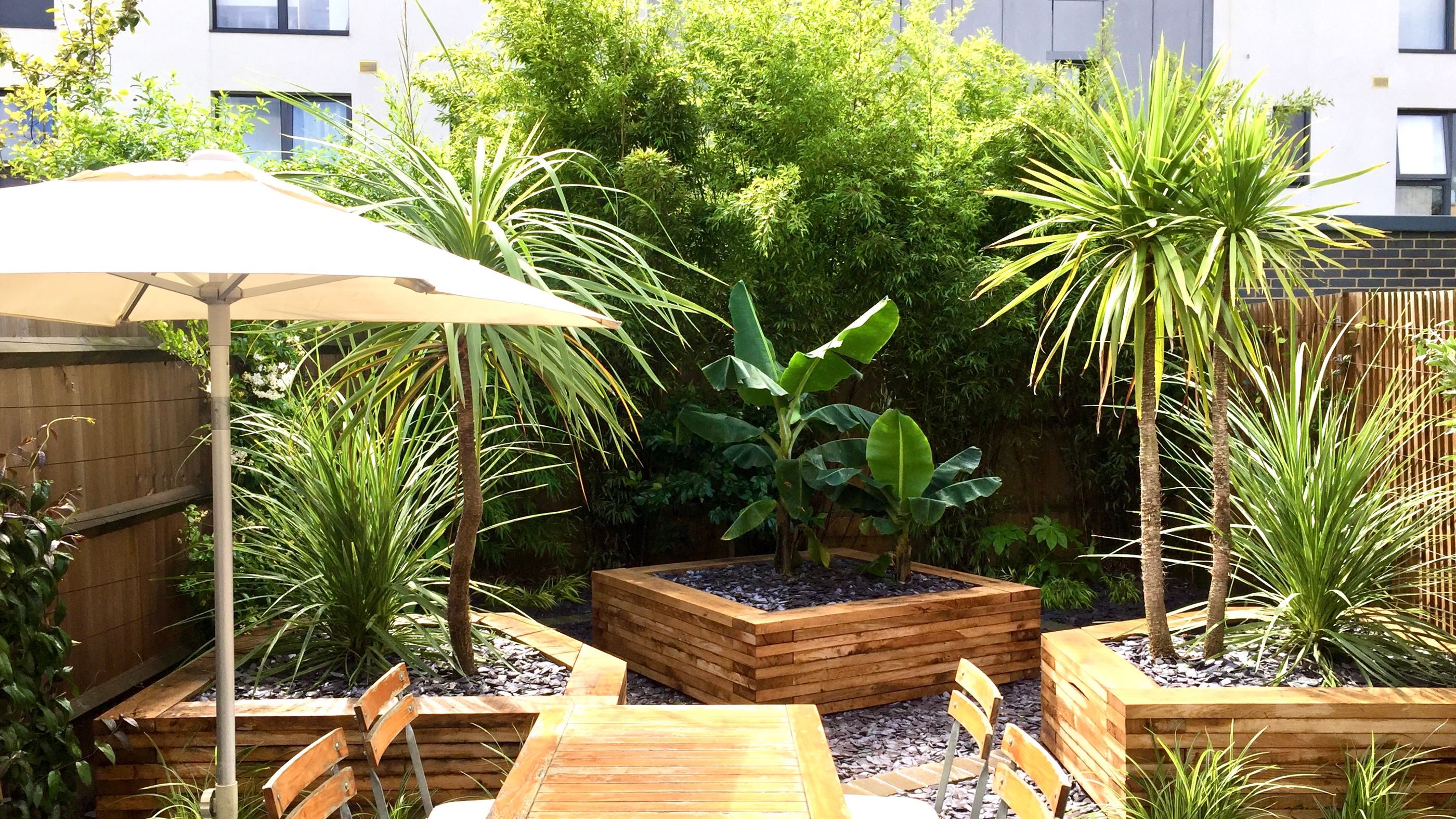 Landscaping Hackney with Easy-Care Mature Planting in Unique Planters