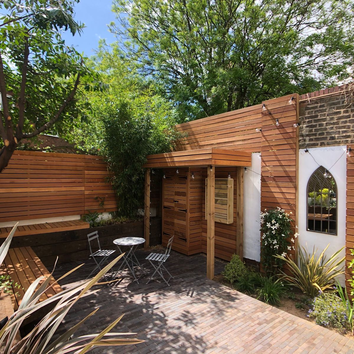 Garden Landscaping in Hackney Central North London with Hardscape Features such as Fencing and Brick Patio