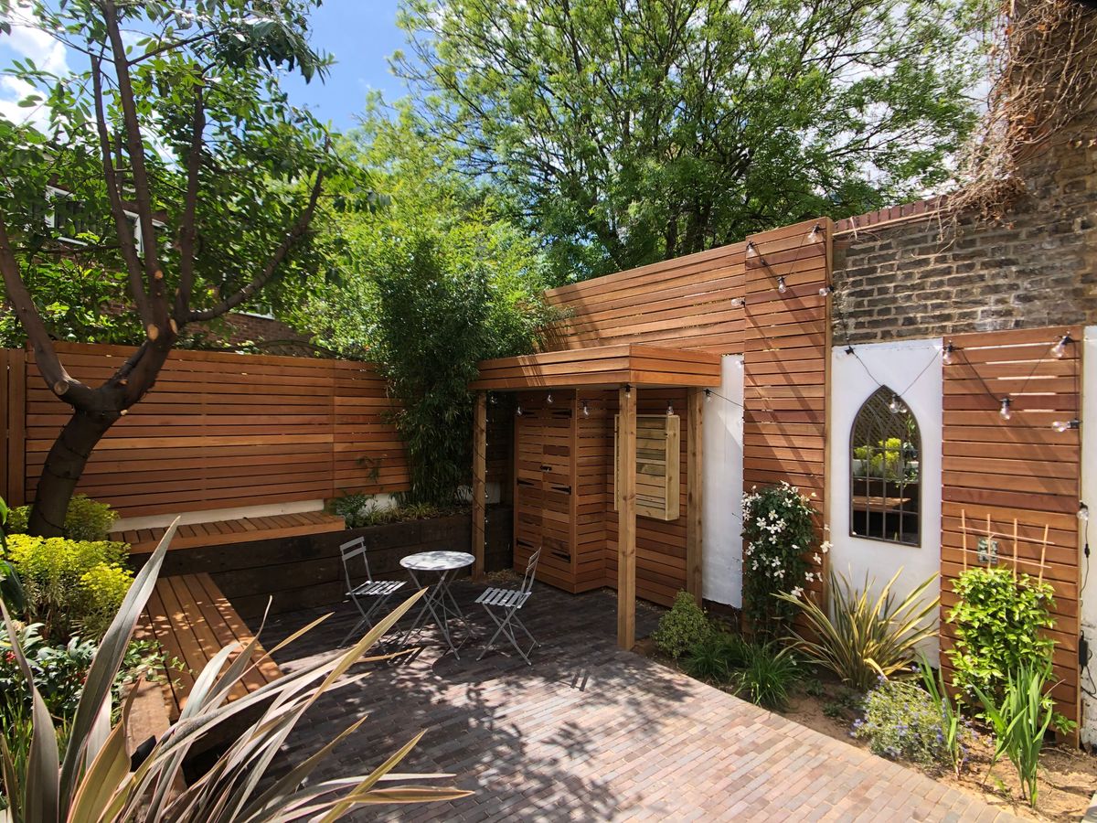 Completed Courtyard Garden in Hackney Central North London with Trellis Fencing and Benches