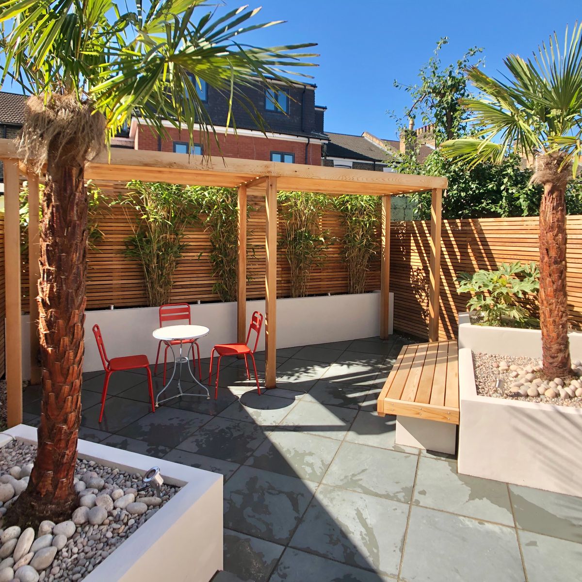 Garden Landscape and Build in Forest Gate East London with Architectural Planting in Rendered Planters