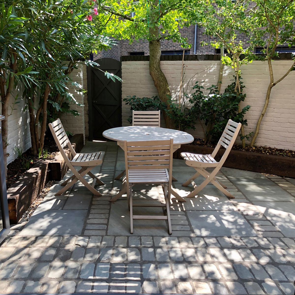 Residential Landscaping and Build in Muswell Hill North London Courtyard Garden with Tumbled Grey Indian Sandstone Setts
