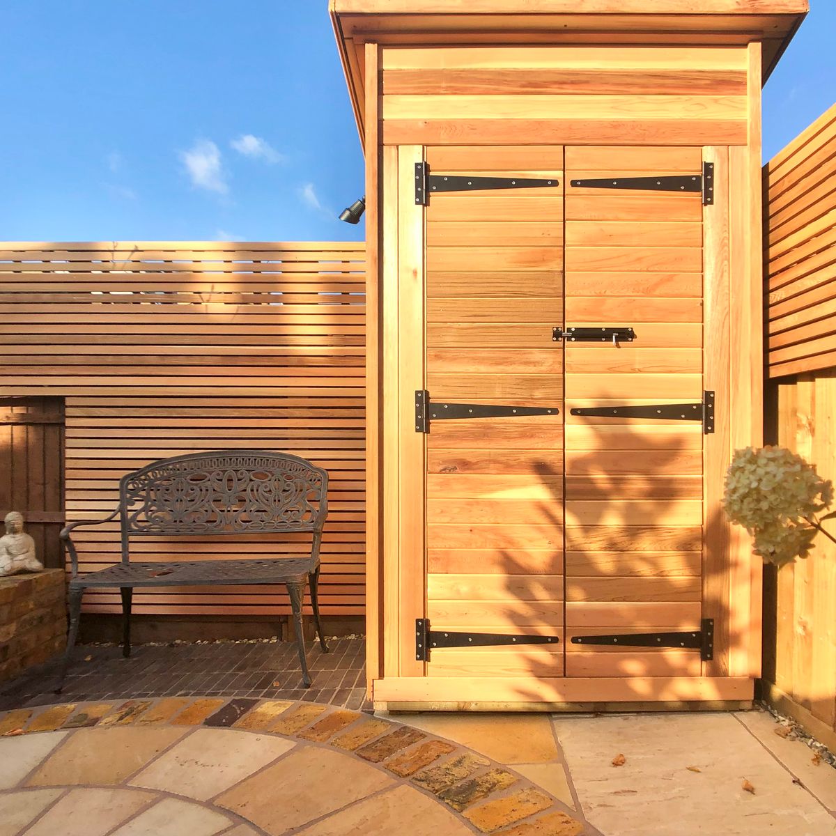 Bespoke Cedar Trellis and Shiplap Shed in Suntrap Corner of Back Yard Design in Dalston North London