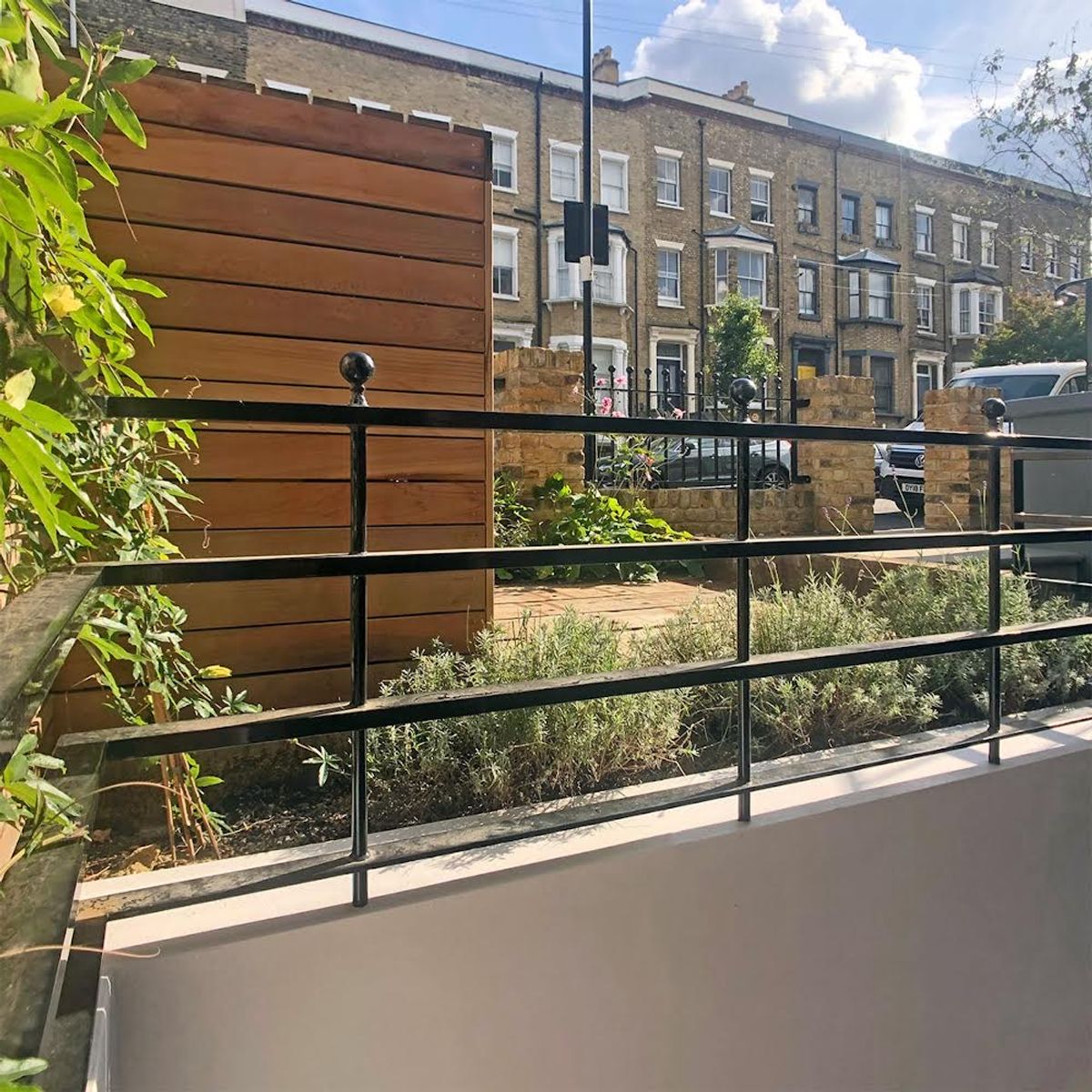 Garden Landscape Design in Stoke Newington Hackney North London with Yorkstone Steps and New Retaining Wall